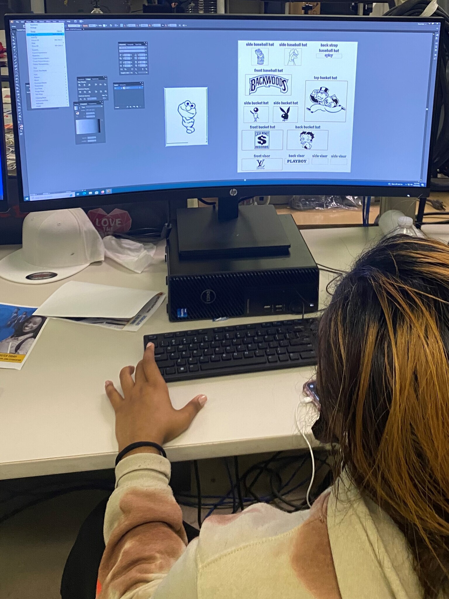 student working on graphic design