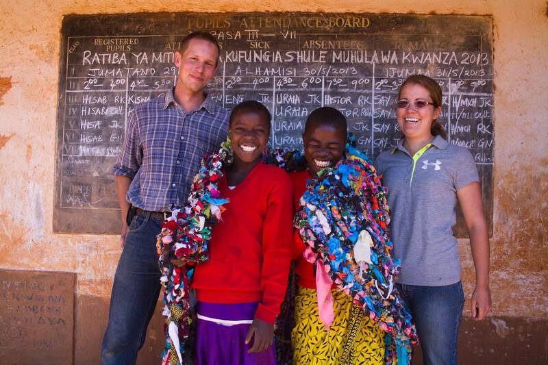 picture of Mrs. Meyer with Mr. Meyer and 2 Tanzanian students